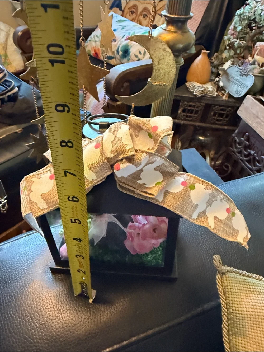 Glass & metal terrarium with artificial flowers and bunny rabbit figurine